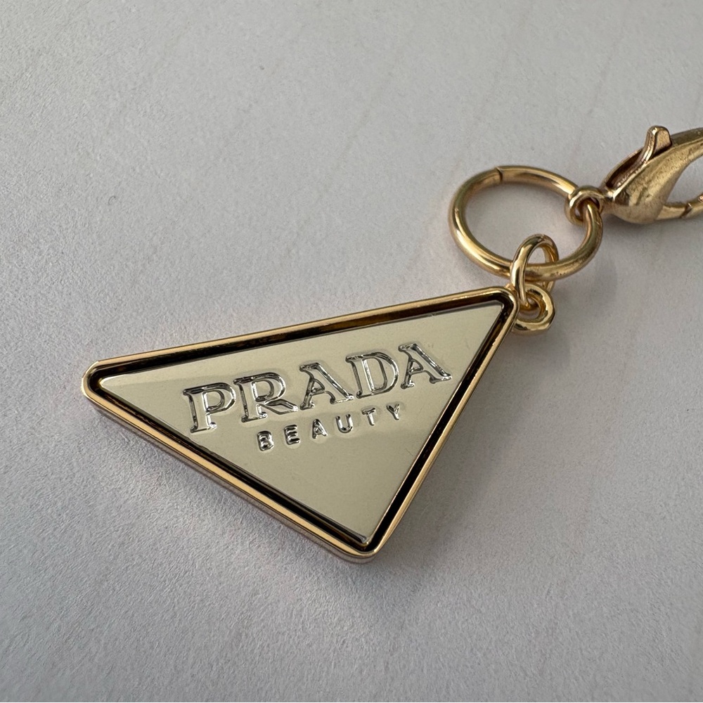 Prada Gold Triangle Logo Charm with Cream Enamel - Picture 5 of 9